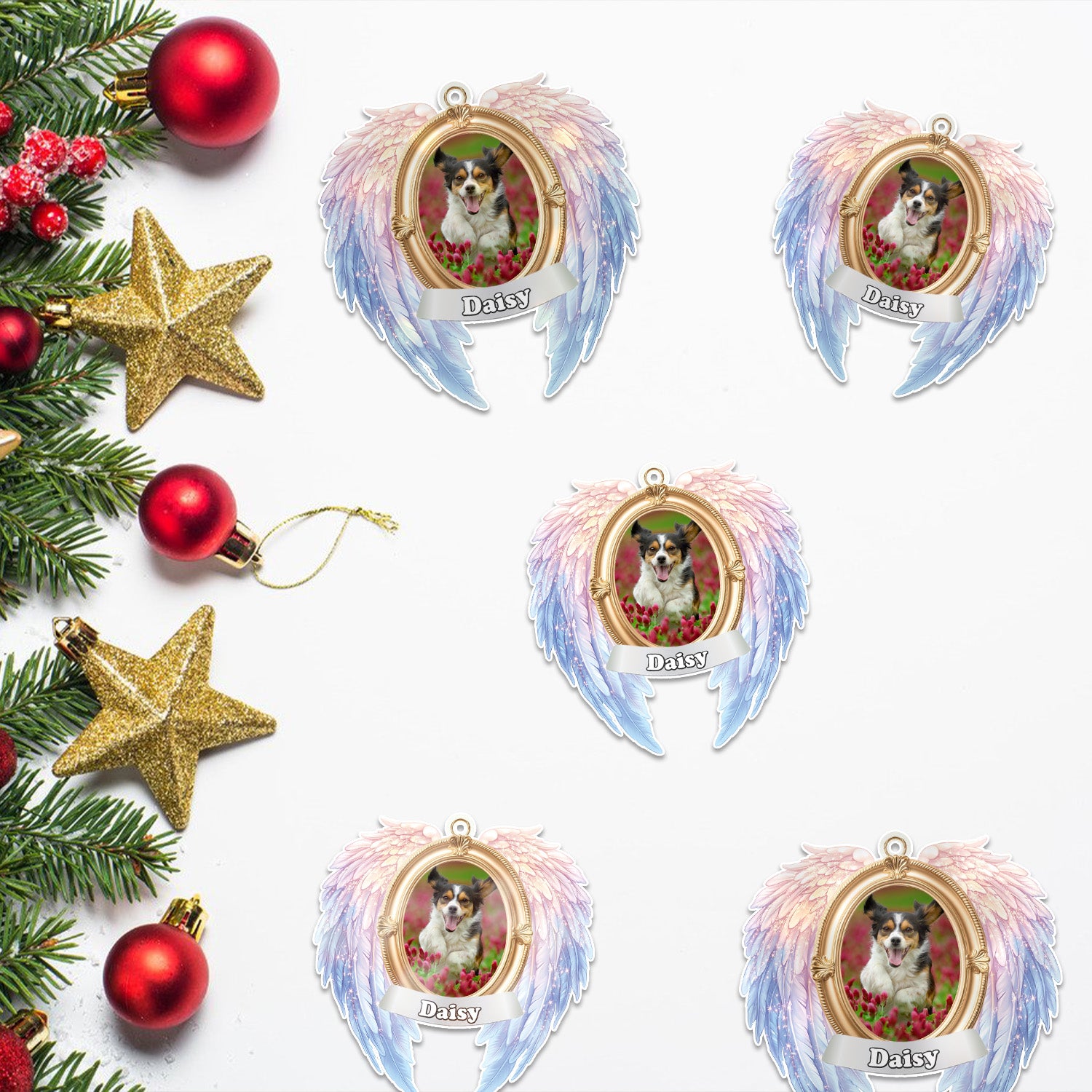 Decorative angel wing ornaments with a dog's photo and name 'Daisy', surrounded by Christmas decorations.